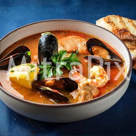 traditional-bouillabaisse-with-fresh-seafood-and-toasted-baguette