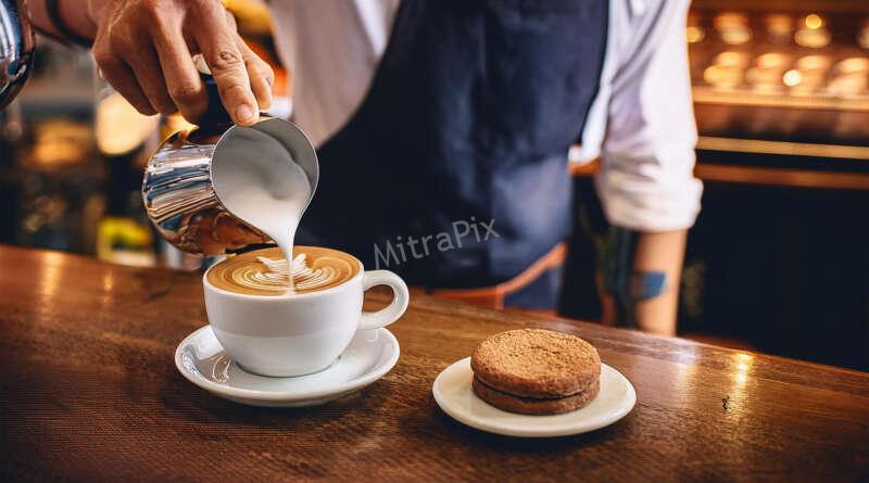 Barista Pouring Artisan Coffee with Latte Art