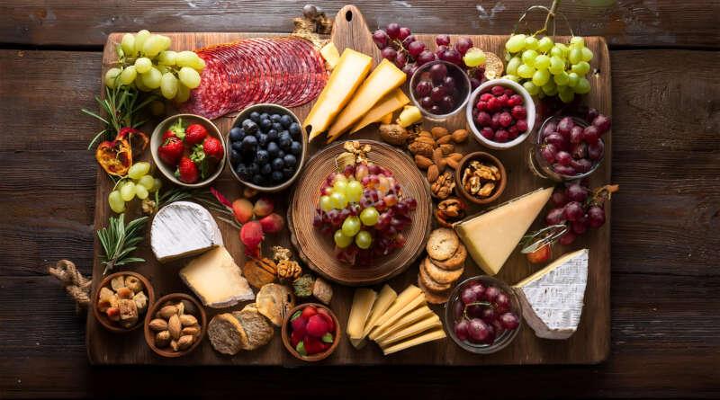 Beautifully Arranged Charcuterie Board with Gourmet Cheeses and Meats